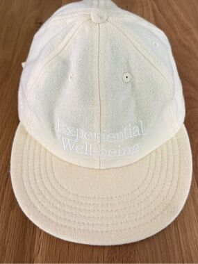 100% Wool Cream Embroidered 'Experiential Well-being' Baseball Cap